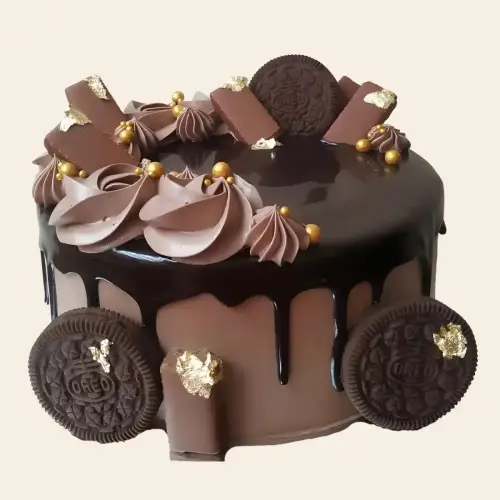 Chocolate overloaded cake with Oreo cookies, 5-star chocolates, chocolate flowers, and golden pearls