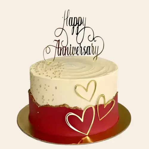 Red cream split cake with silver sugar pearls and chocolate silver-coated hearts